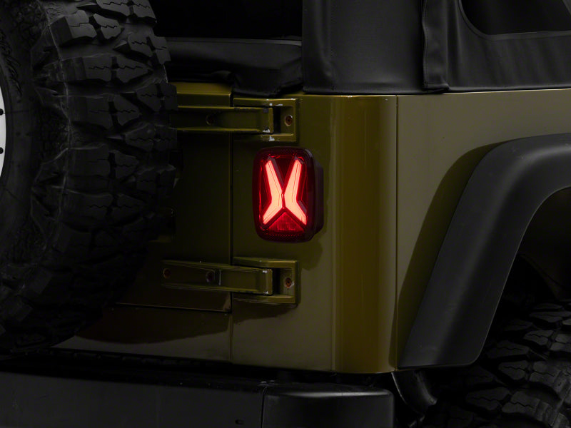 Raxiom 76-06 Jeep CJ7 Wrangler YJ &amp; TJ Gladiator LED Tail Lights- Black Housing (Smoked Lens)