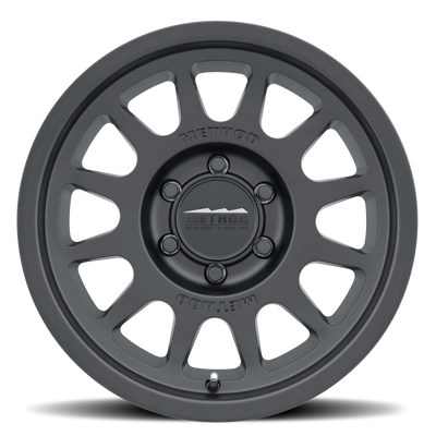 Method MR703 17x8.5 0mm Offset 6x135 87mm CB Matte Black Wheel